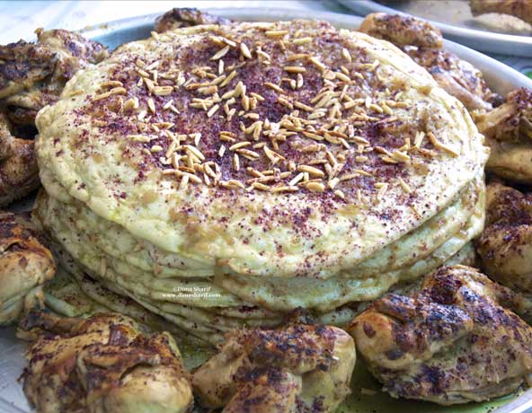 Try the palestinian bread in the form of Taboon Bread
