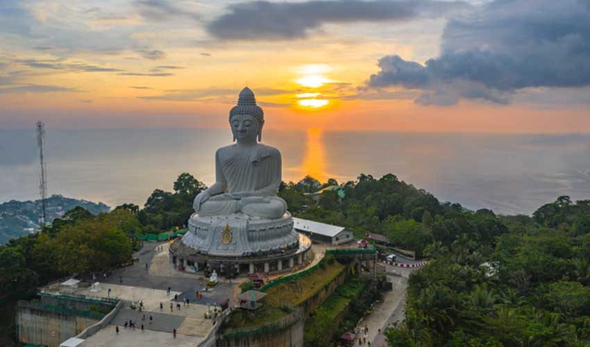 Statue of big buddha phuket with sunset view